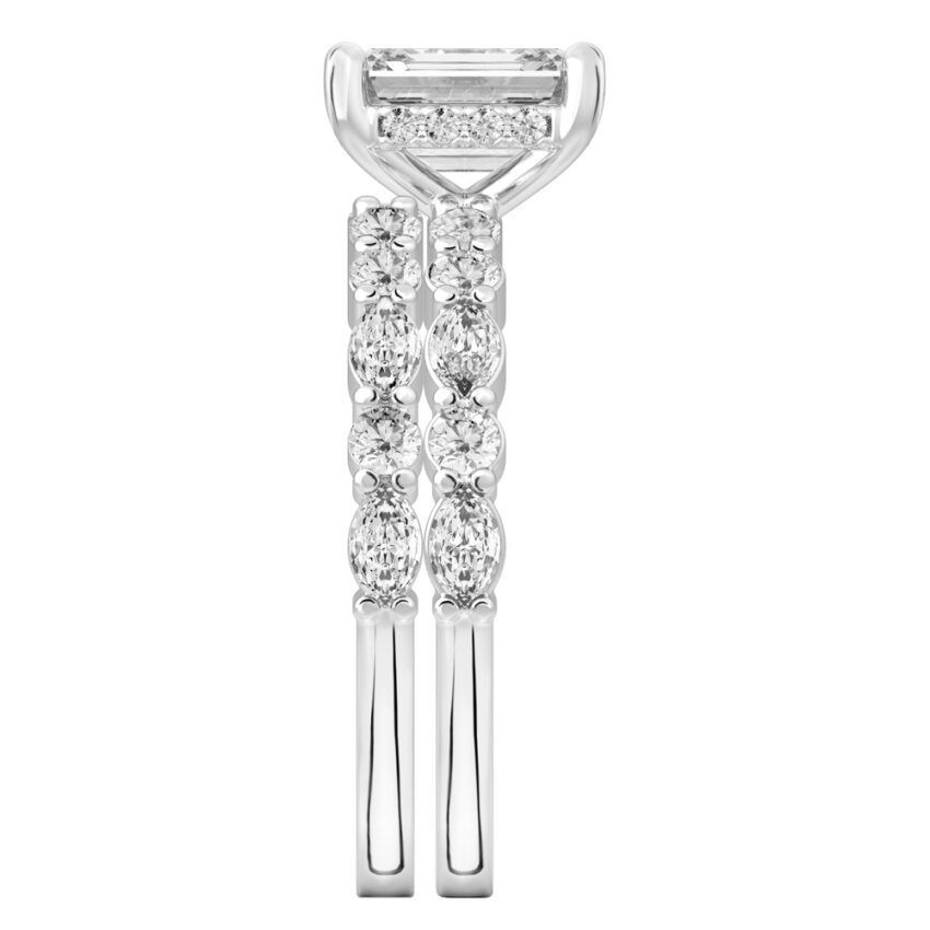 Side view of emerald cut diamond hidden halo marquise and round diamond ring set platinum