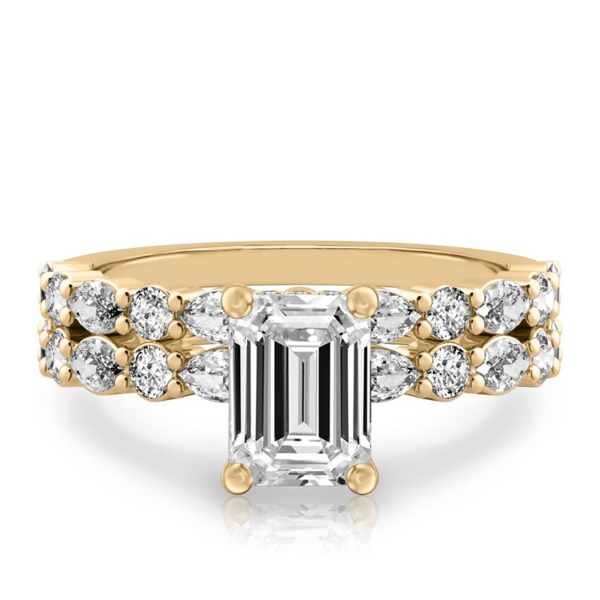 emerald cut diamond hidden halo marquise and round diamond ring set yellow gold