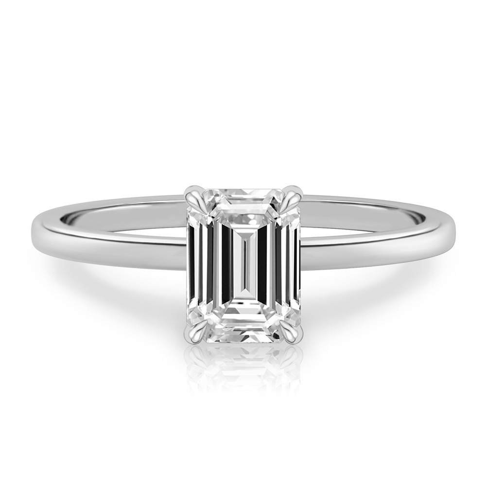 emerald cut diamond ultra low hidden halo engagement ring in platinum