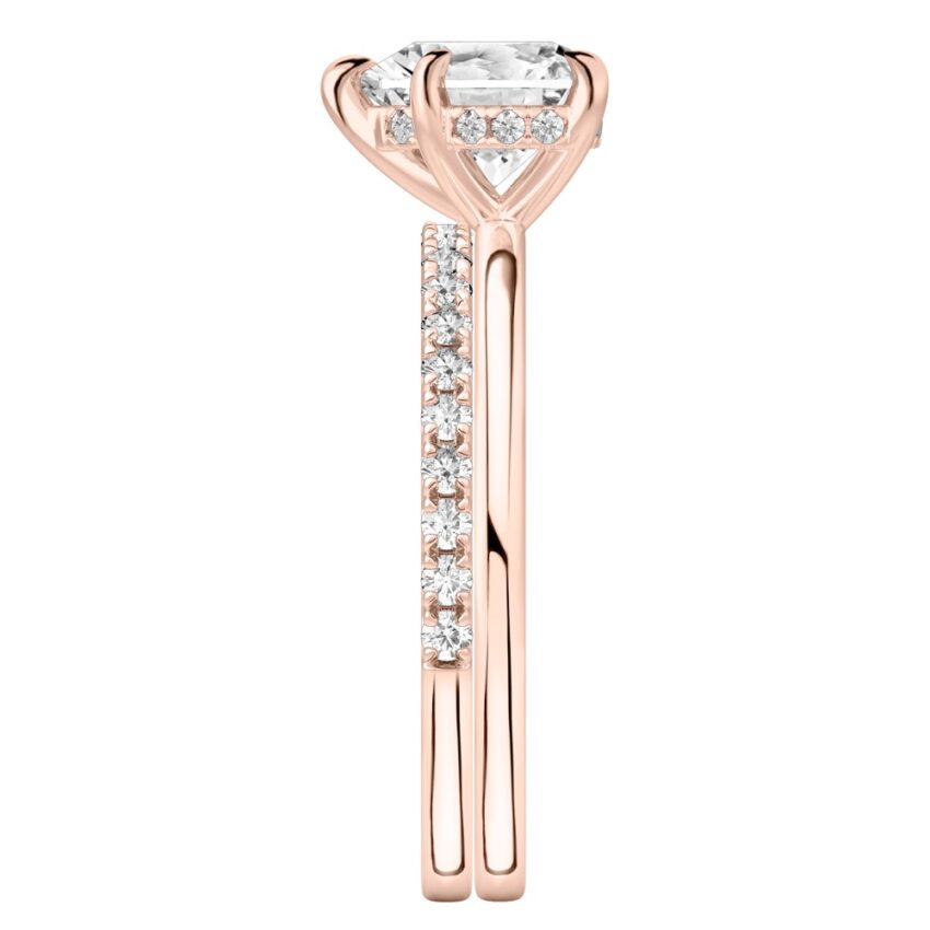 Side view of heart shape diamond hidden halo engagement ring set rose gold