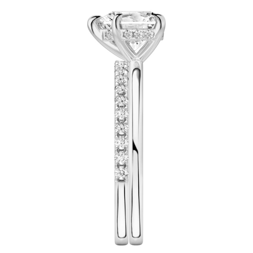 Side view of heart shape diamond hidden halo engagement ring set white gold