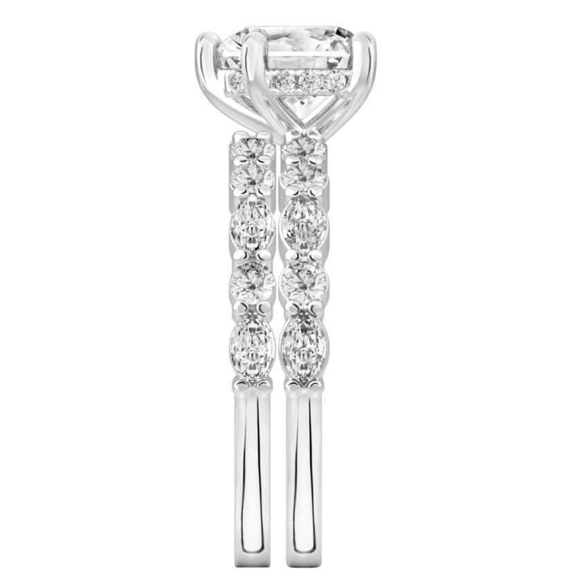 Side view of heart shape diamond hidden halo marquise and round diamond ring set platinum