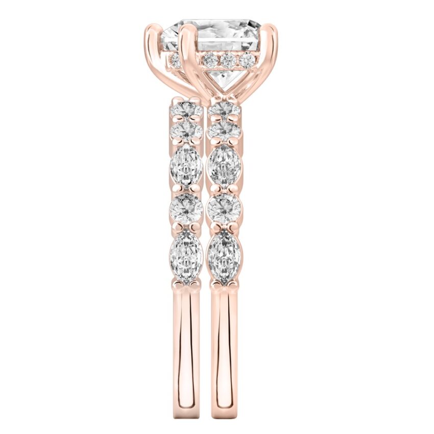 Side view of heart shape diamond hidden halo marquise and round diamond ring set rose gold