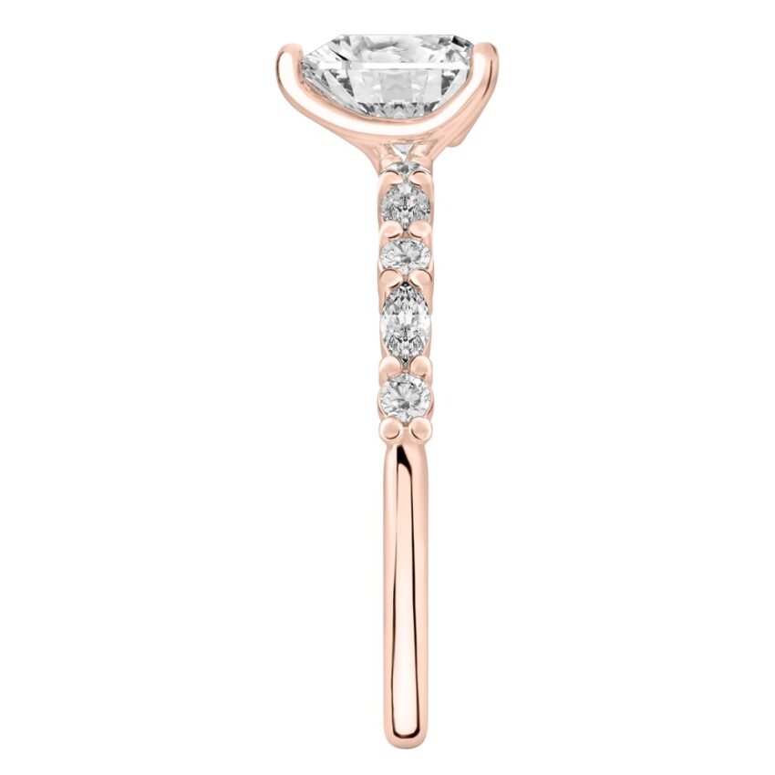 Side view of heart shape diamond marquise and round diamond ring rose gold