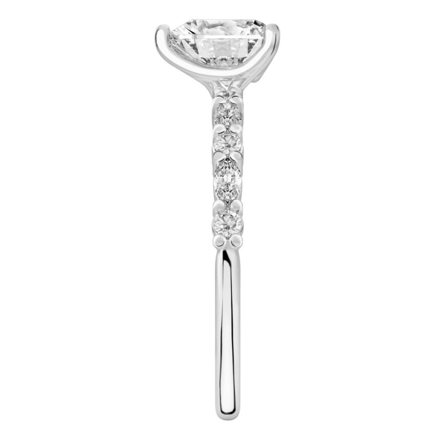 Side view of heart shape diamond marquise and round diamond ring white gold