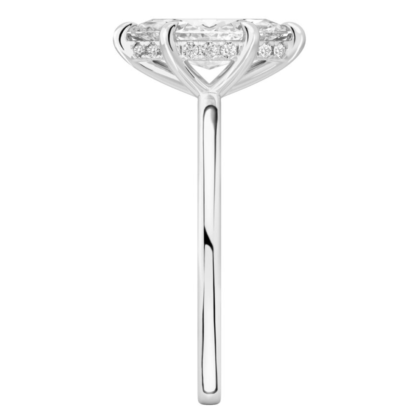 Side view of marquise cut diamond hidden halo engagement ring in white gold