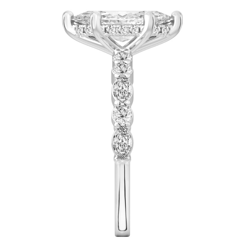 Side view of marquise cut diamond hidden halo marquise and round diamond ring platinum
