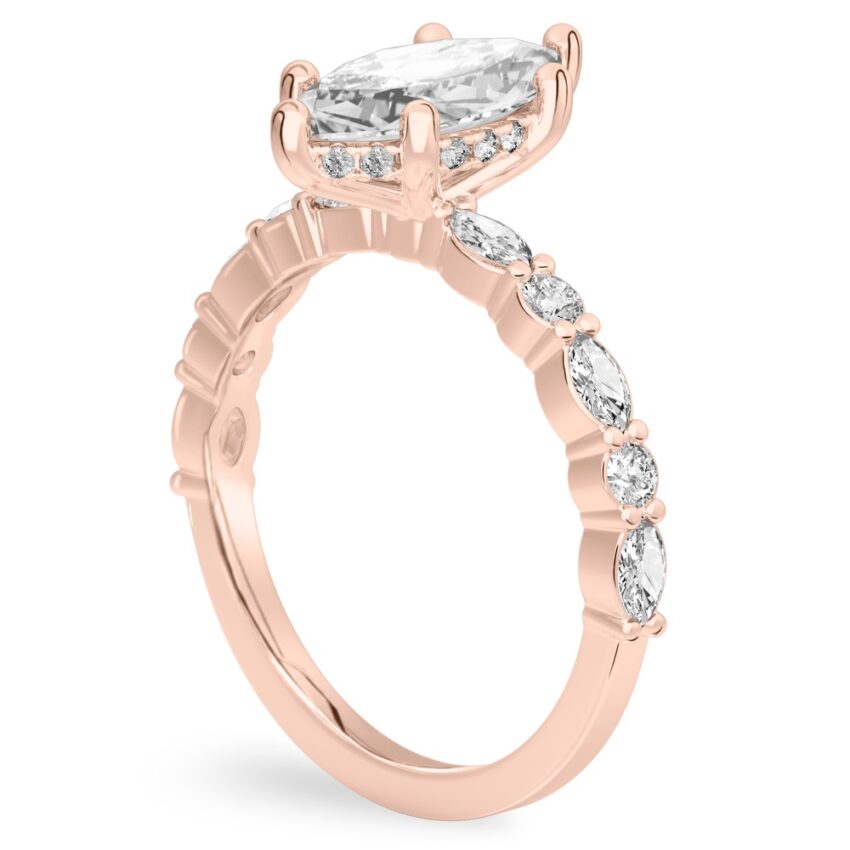 Angle view of marquise cut diamond hidden halo marquise and round diamond ring rose gold