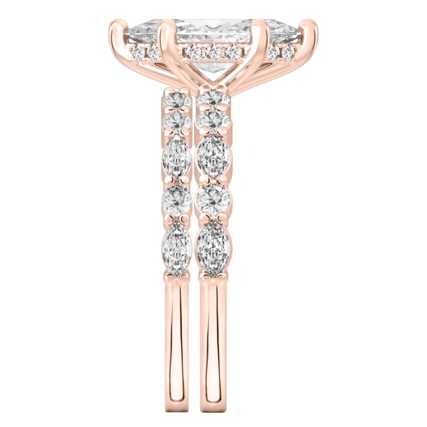 Side view of marquise cut diamond hidden halo marquise and round diamond ring set rose gold