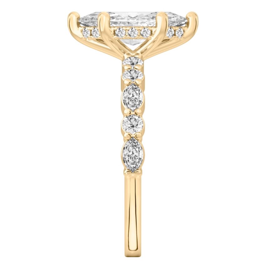 Side view of marquise cut diamond hidden halo marquise and round diamond ring yellow gold