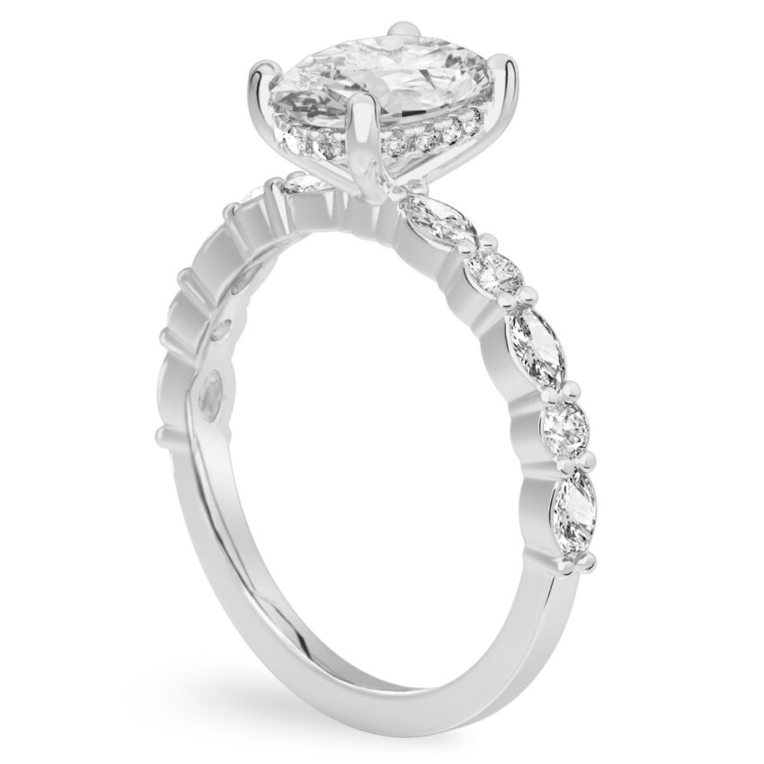 Angle view of oval cut diamond hidden halo marquise and round diamond ring platinum