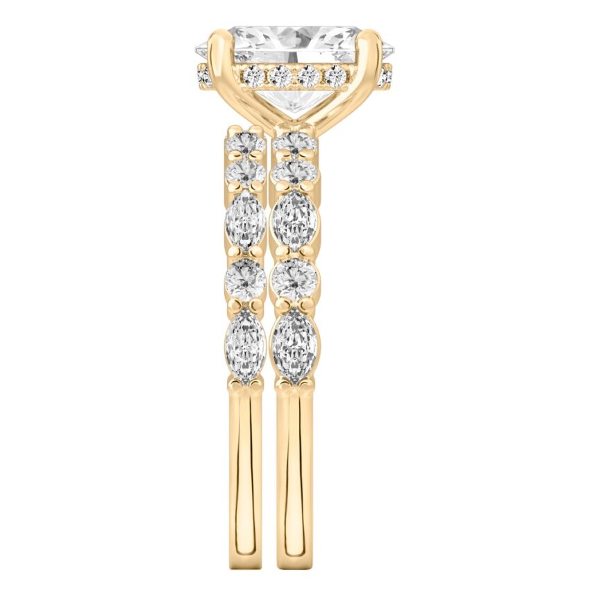 Side view of oval cut diamond hidden halo marquise and round diamond ring set yellow gold