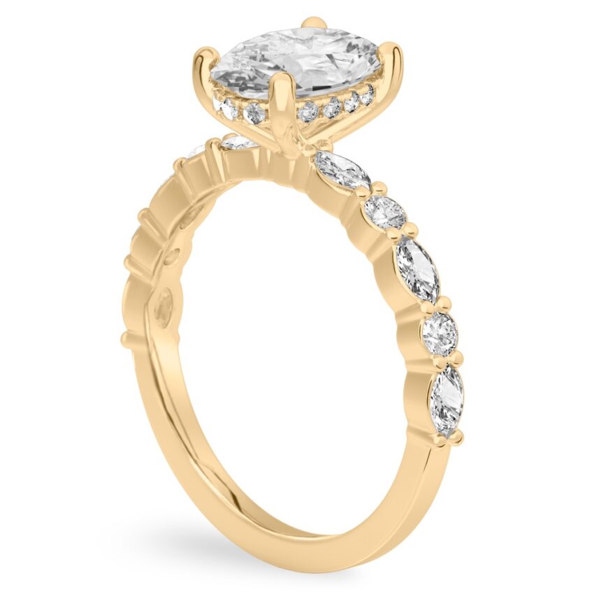 Angle view of oval cut diamond hidden halo marquise and round diamond ring yellow gold