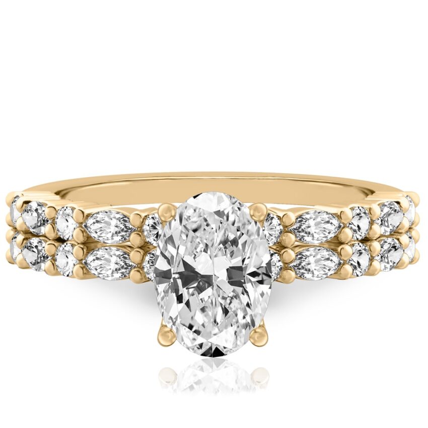 oval cut diamond marquise and round diamond ring set yellow gold