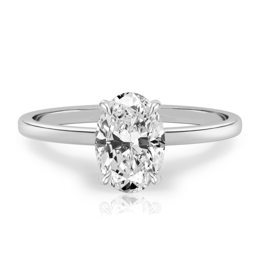 oval shape diamond ultra low hidden halo engagement ring in platinum