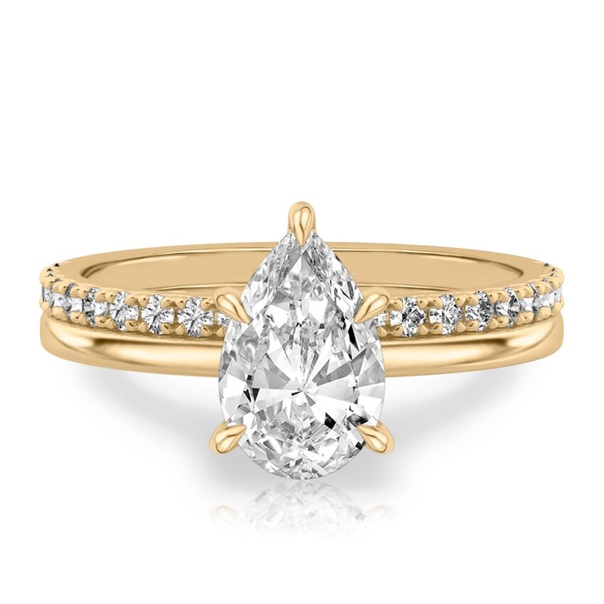 pear shape diamond hidden halo engagement ring set yellow gold