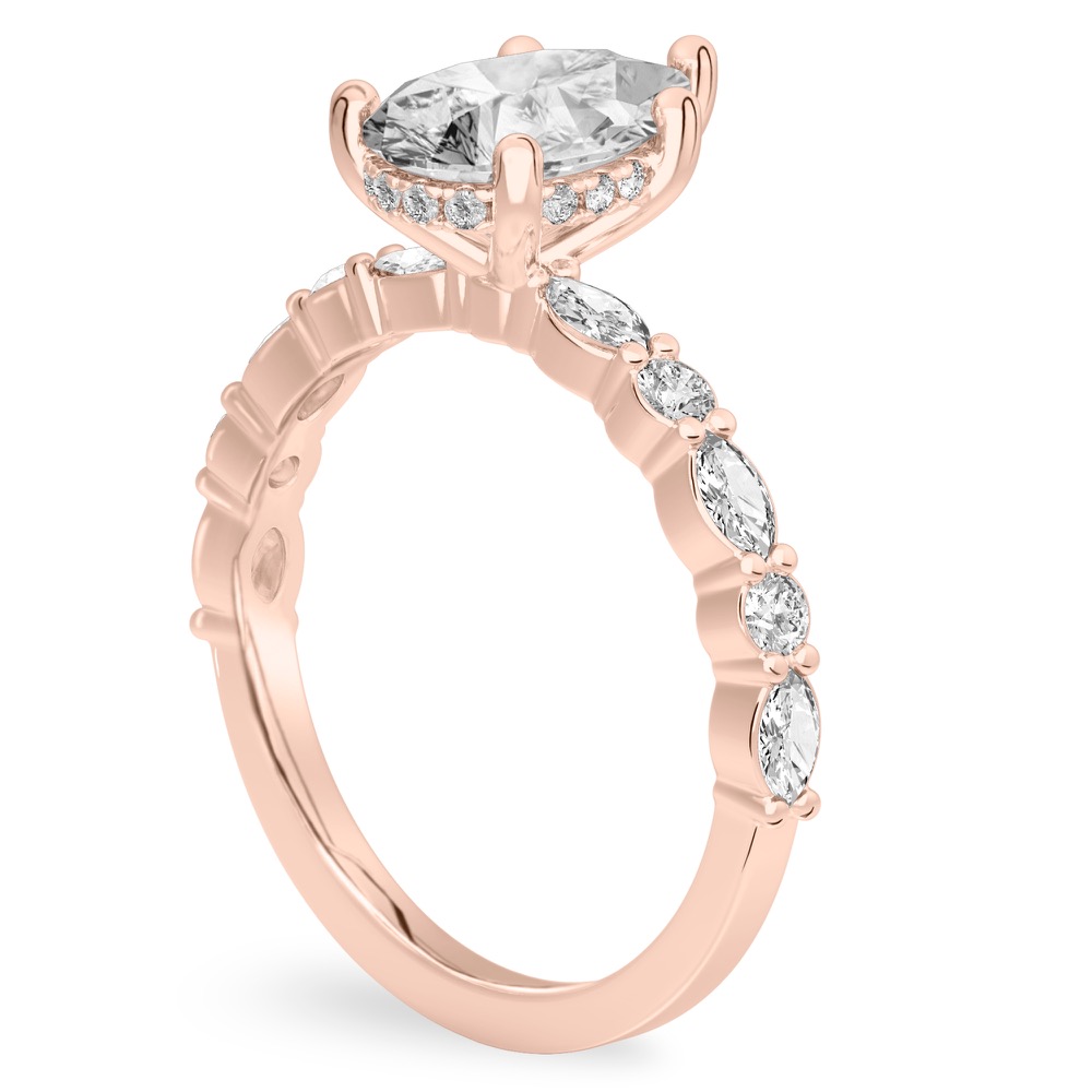 Angle view of pear shape diamond hidden halo marquise and round diamond ring rose gold