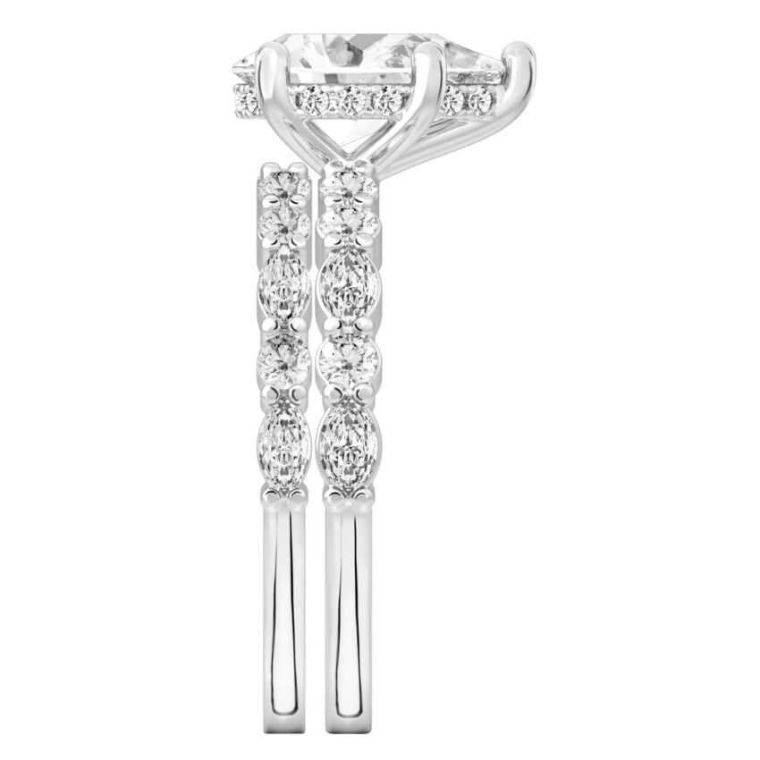 Side view of pear shape diamond hidden halo marquise and round diamond ring set white gold