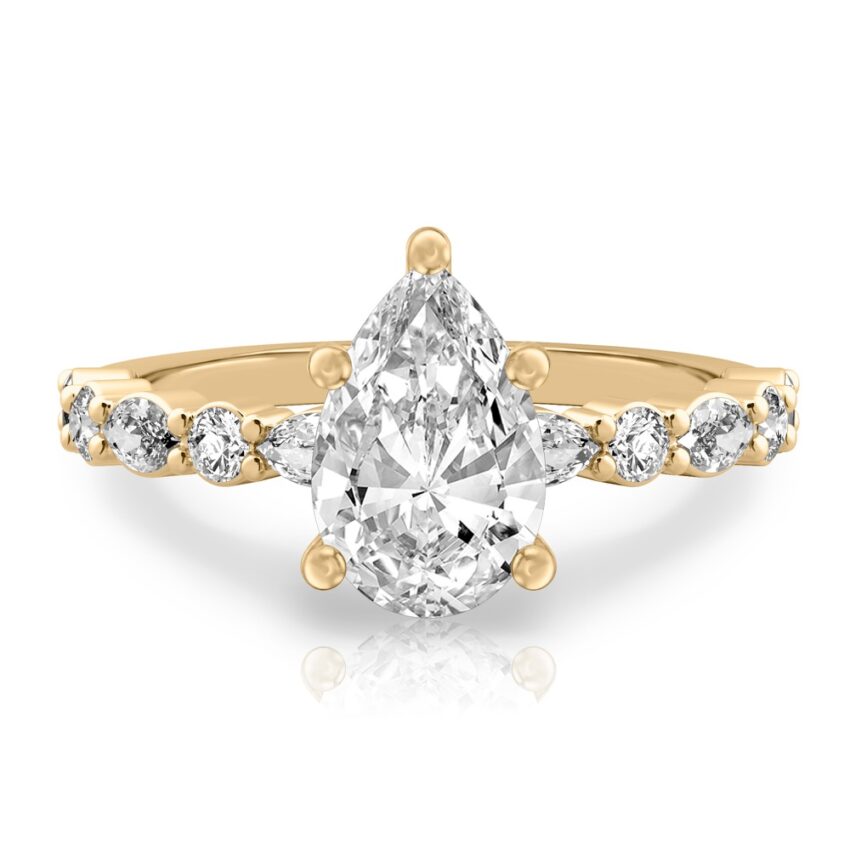 pear shape diamond hidden halo marquise and round diamond ring yellow gold