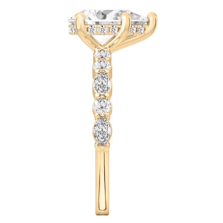Side view of pear shape diamond hidden halo marquise and round diamond ring yellow gold