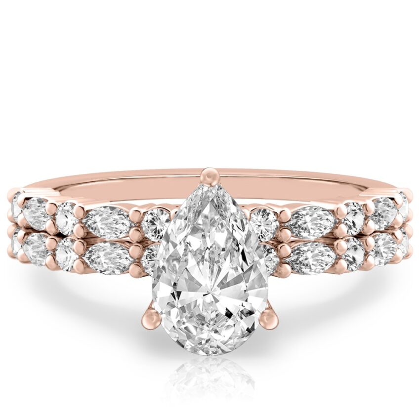 pear shape diamond marquise and round diamond ring set rose gold
