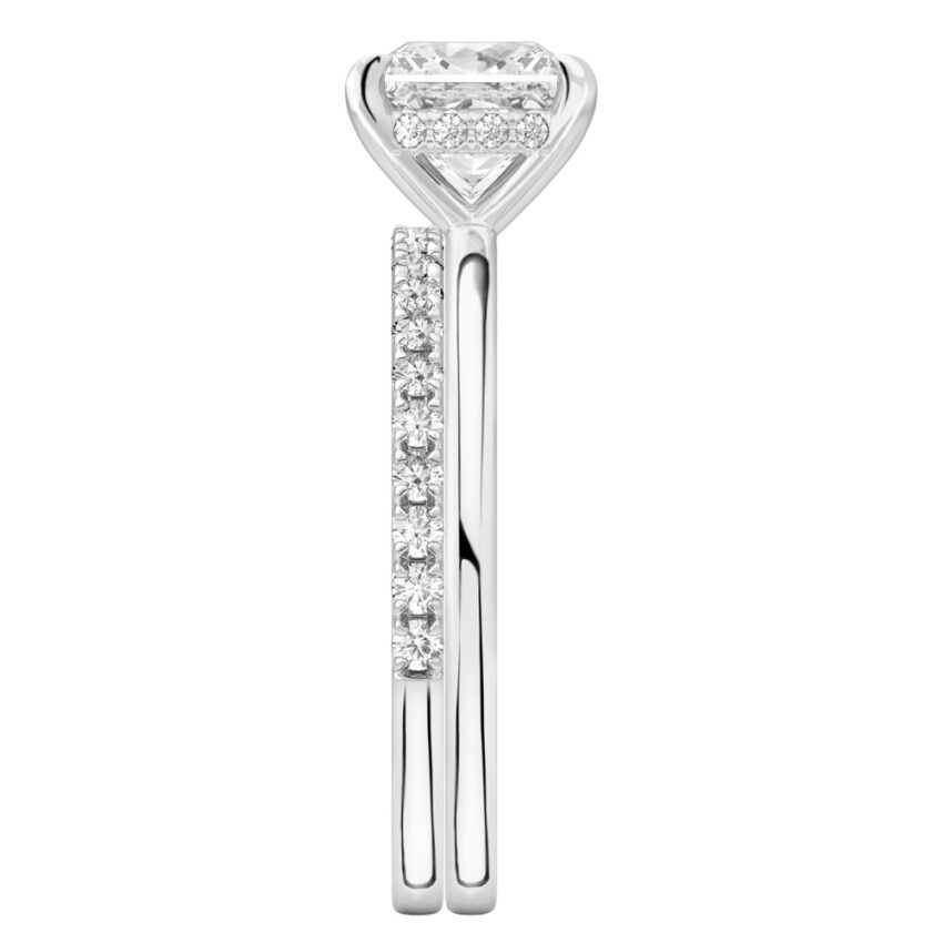 Side view of princess cut diamond hidden halo engagement ring set white gold