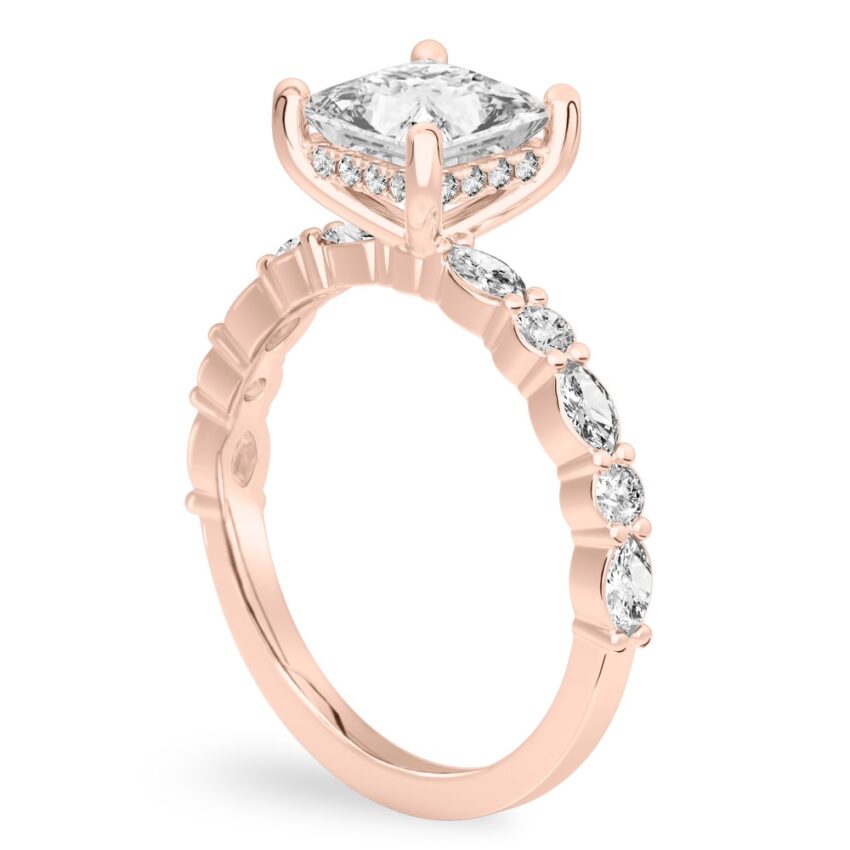 Angle view of princess cut diamond hidden halo marquise and round diamond ring rose gold