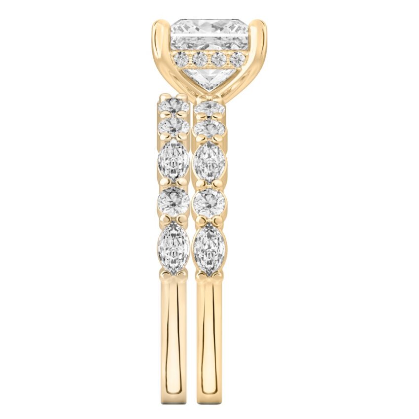 Side view of princess cut diamond hidden halo marquise and round diamond ring set yellow gold