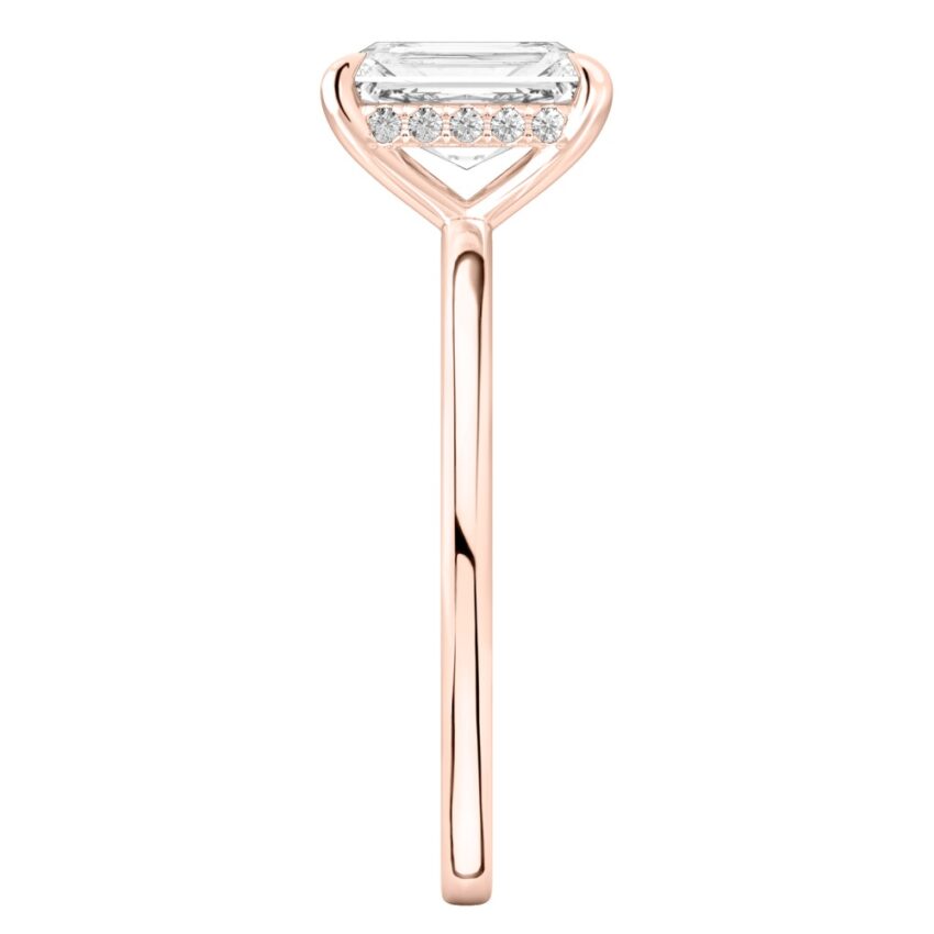 Side view of radiant cut diamond hidden halo engagement ring in rose gold