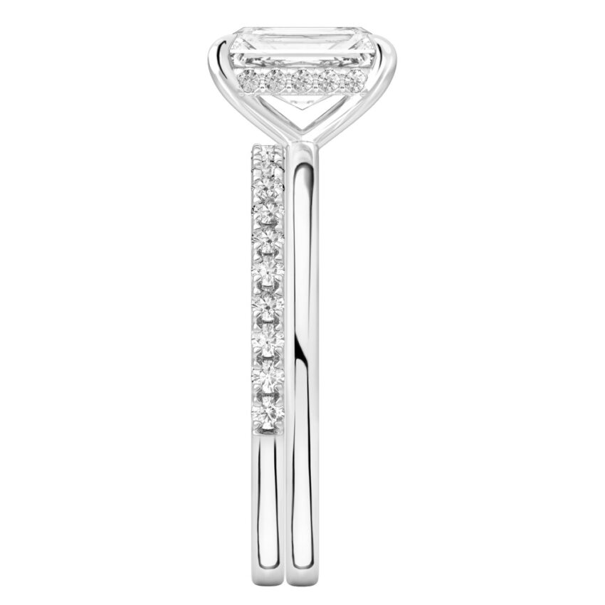 Side view of radiant cut diamond hidden halo engagement ring set platinum