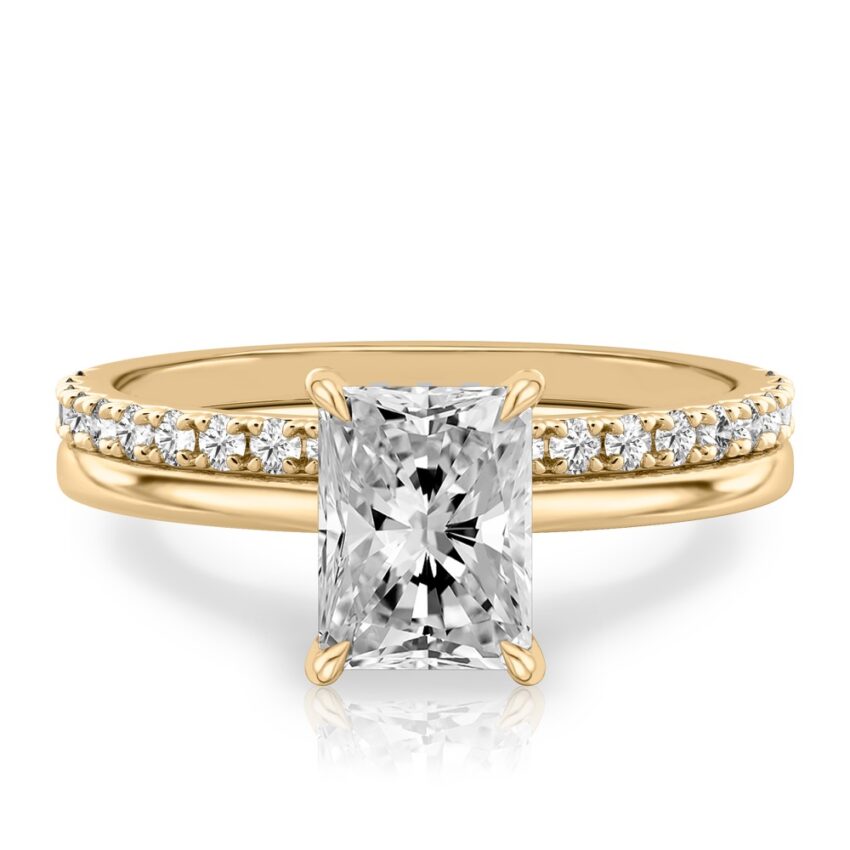 radiant cut diamond hidden halo engagement ring set yellow gold