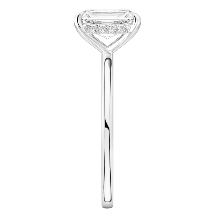 Side view of radiant cut diamond hidden halo engagement ring in white gold