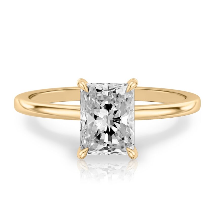 radiant cut diamond hidden halo engagement ring in yellow gold
