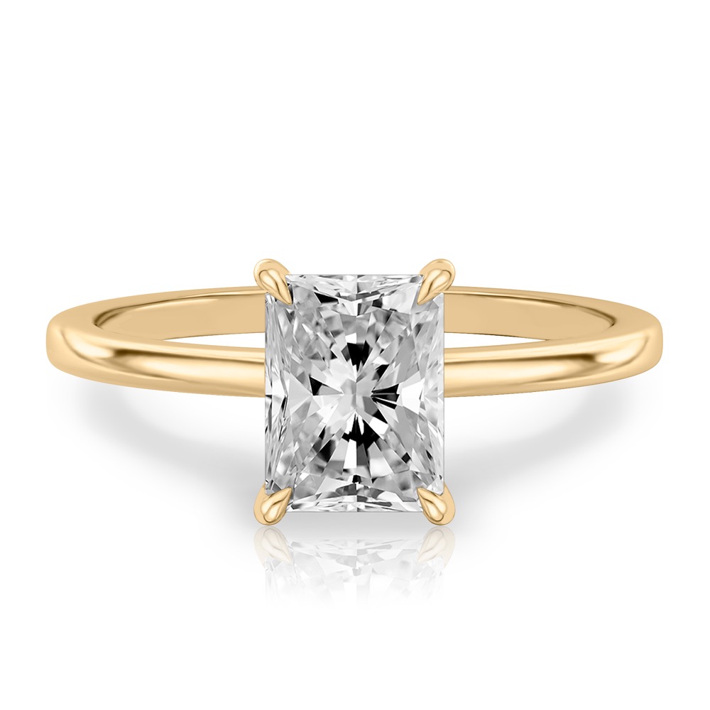 radiant cut diamond hidden halo engagement ring in yellow gold