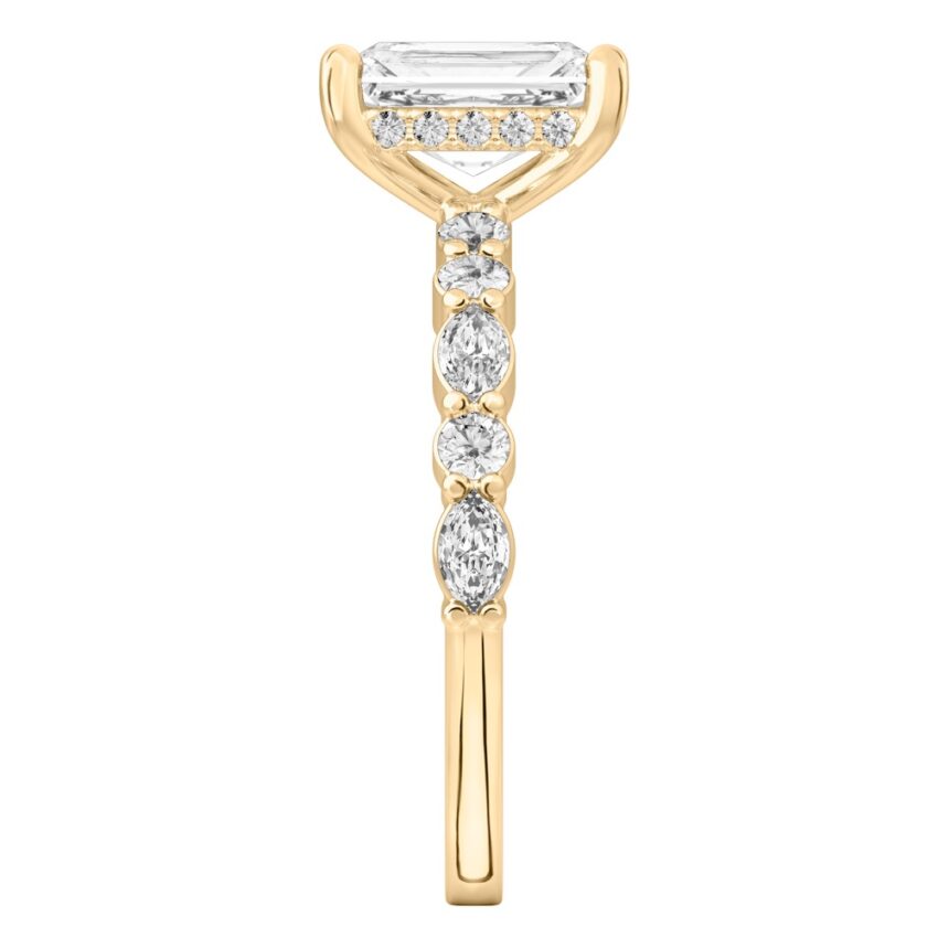 Side view of radiant cut diamond hidden halo marquise and round diamond ring yellow gold