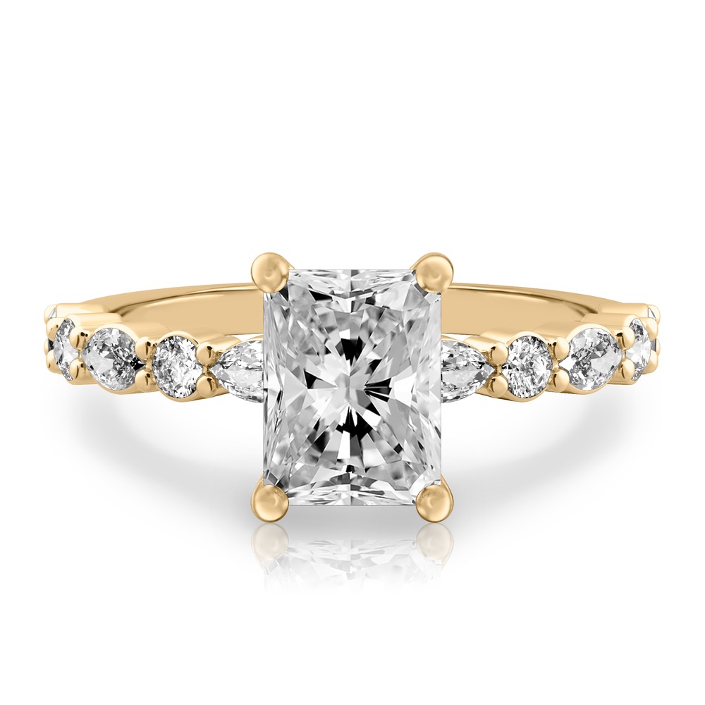 radiant cut diamond hidden halo marquise and round diamond ring yellow gold