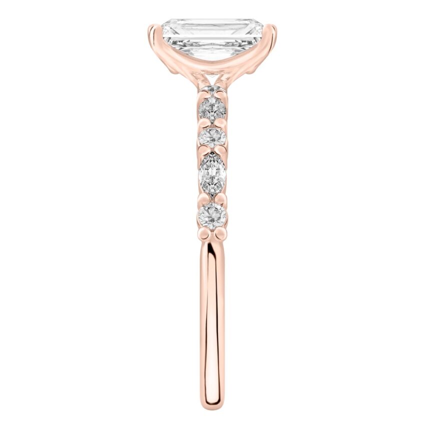 Side view of radiant cut diamond marquise and round diamond ring rose gold