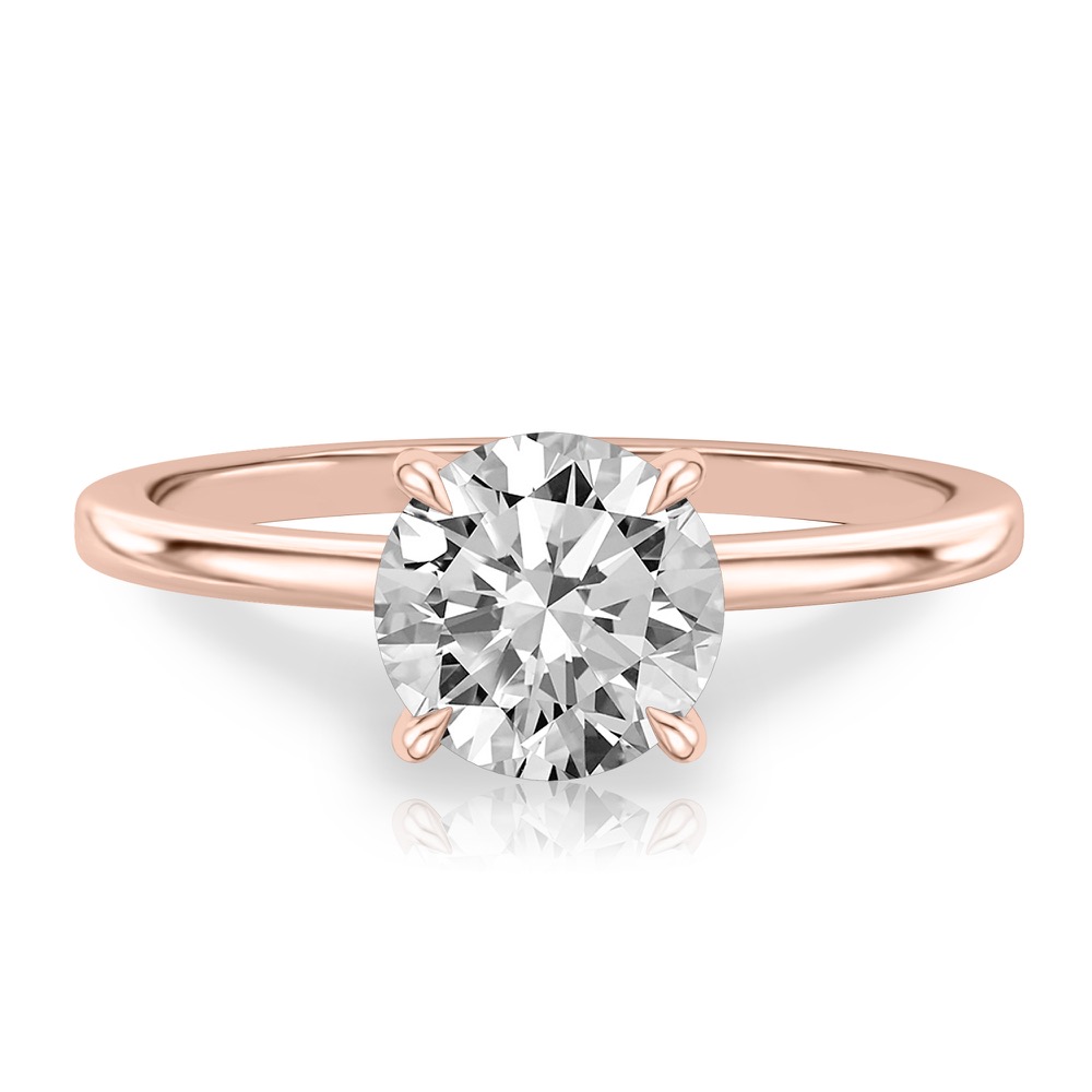 round cut diamond hidden halo engagement ring in rose gold