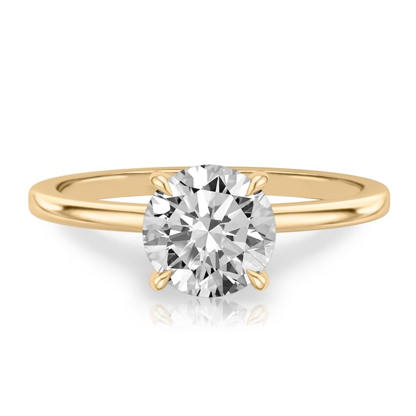 round cut diamond hidden halo engagement ring in yellow gold