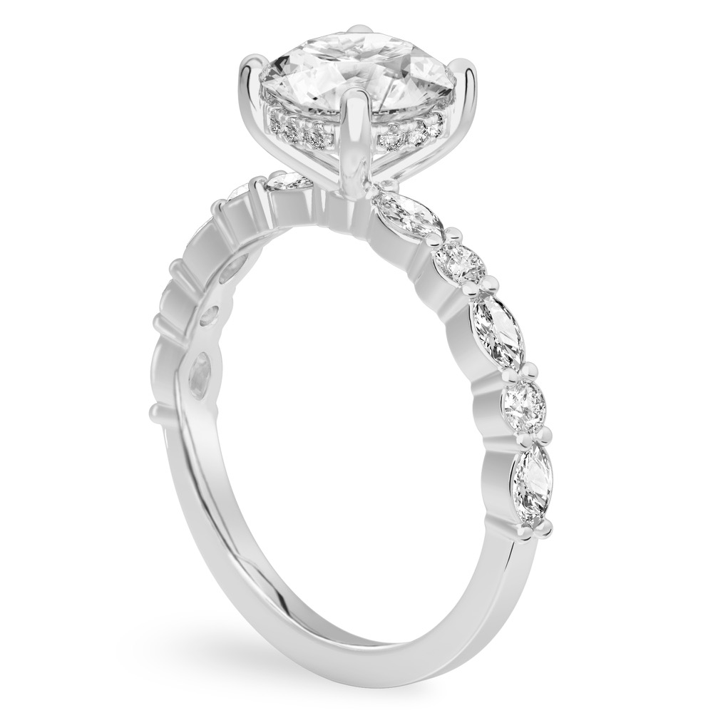 Angle view of round cut diamond hidden halo marquise and round diamond ring platinum