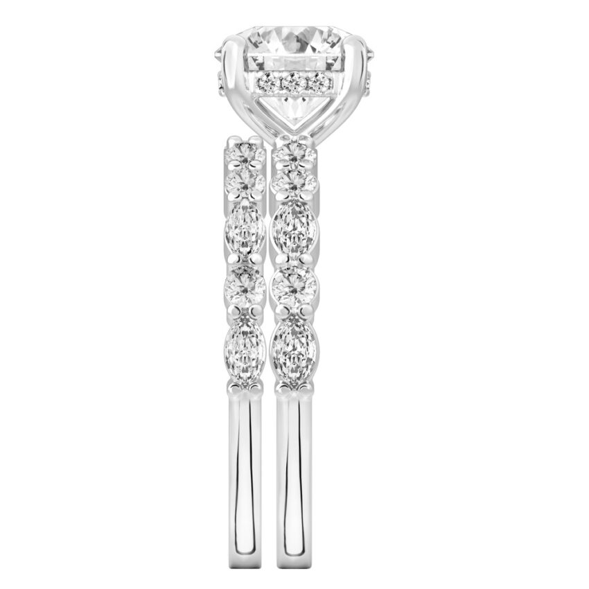 Side view of round cut diamond hidden halo marquise and round diamond ring set palladium