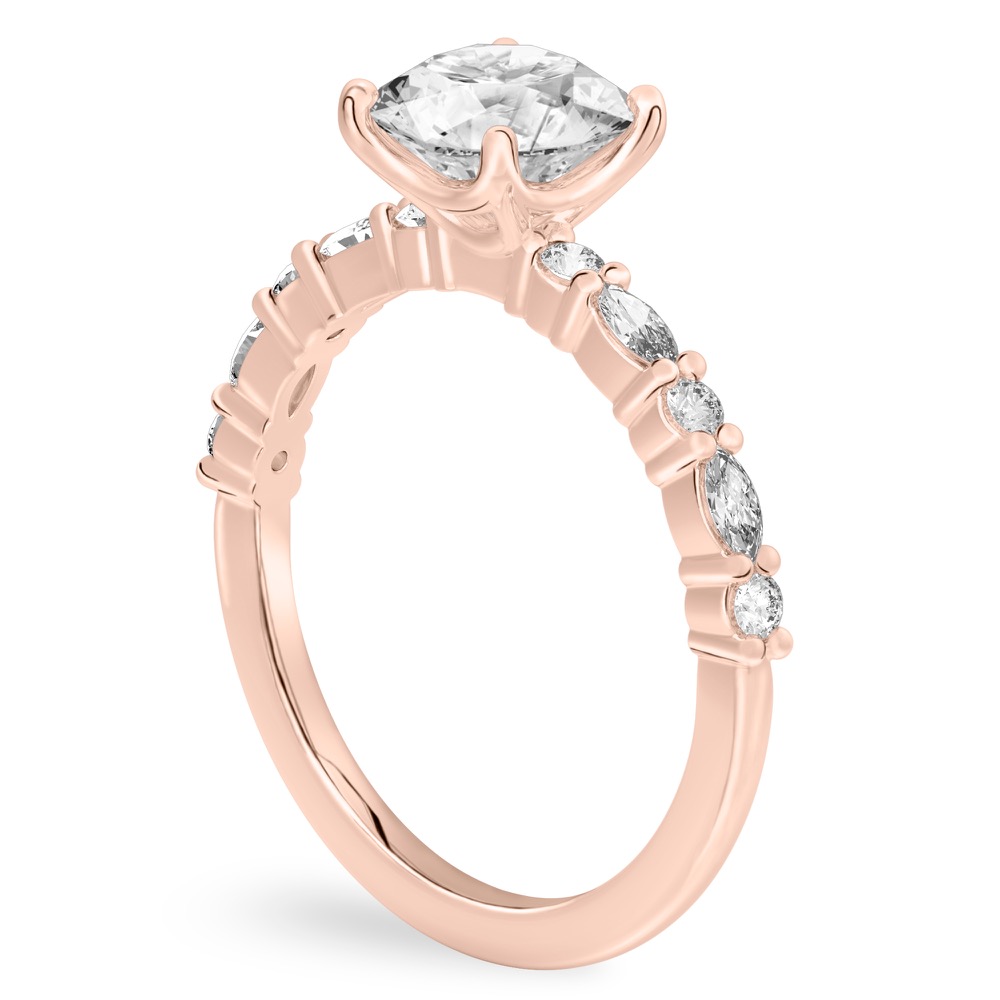 Angle view of round cut diamond marquise and round diamond ring rose gold