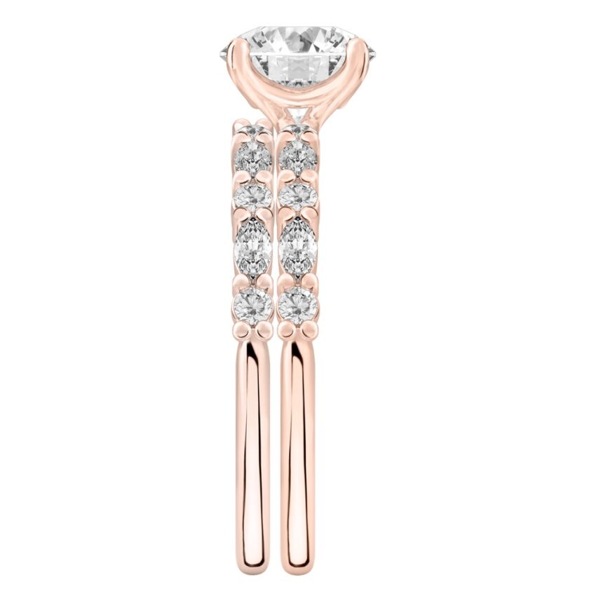 Side view of round cut diamond marquise and round diamond ring set rose gold