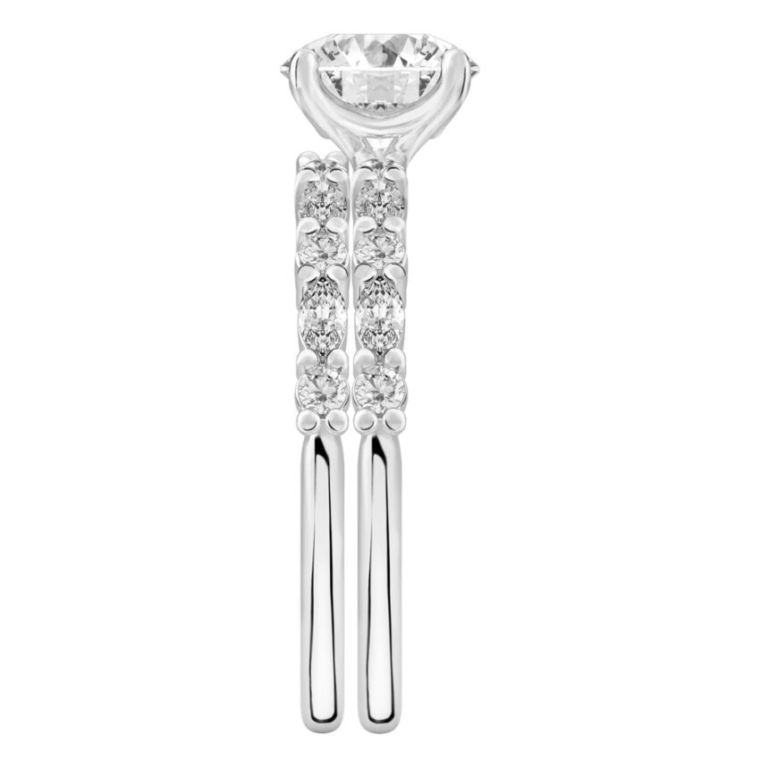 Side view of round cut diamond marquise and round diamond ring set white gold