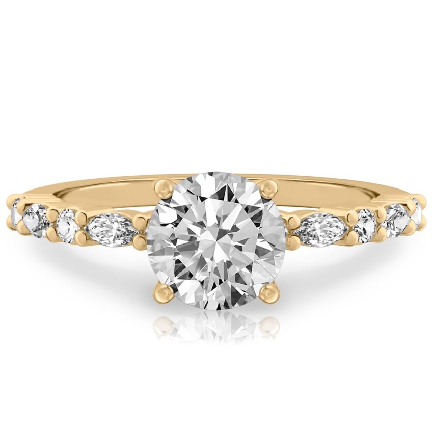 round cut diamond marquise and round diamond ring yellow gold