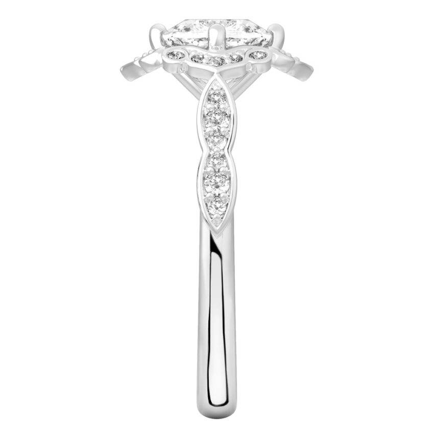 Side view of cushion cut diamond floral engagement ring in white gold