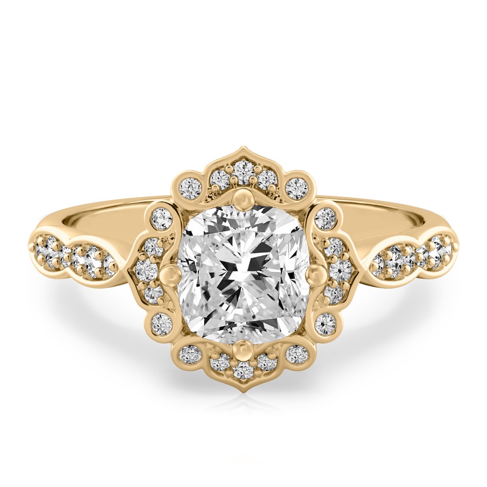 cushion cut diamond floral engagement ring in yellow gold