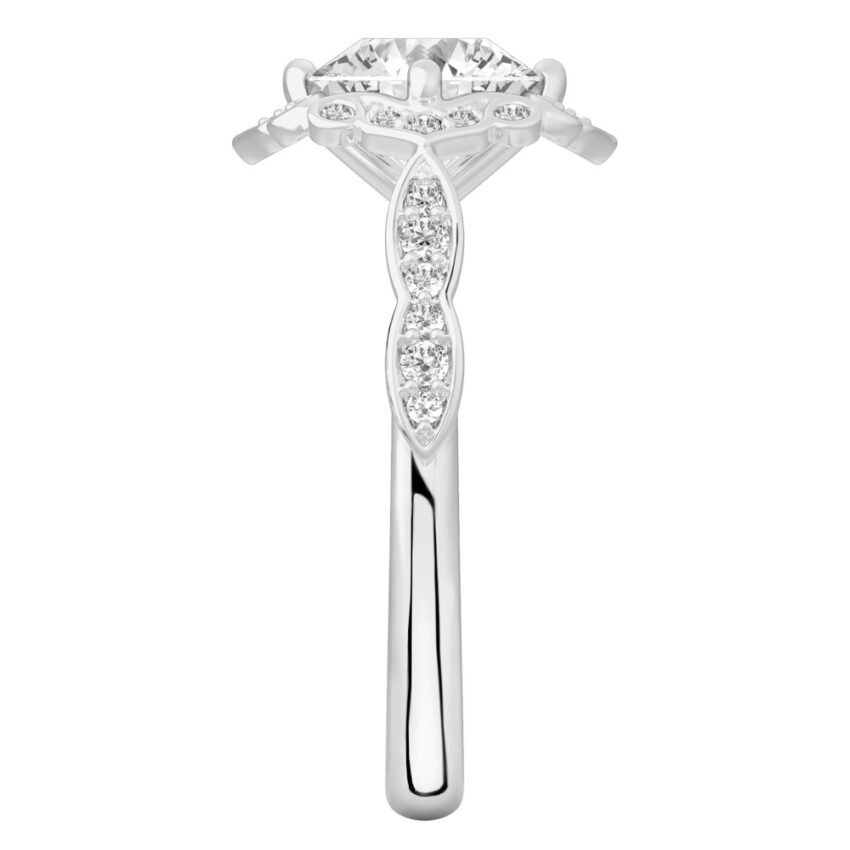 Side view of round cut diamond floral engagement ring in platinum