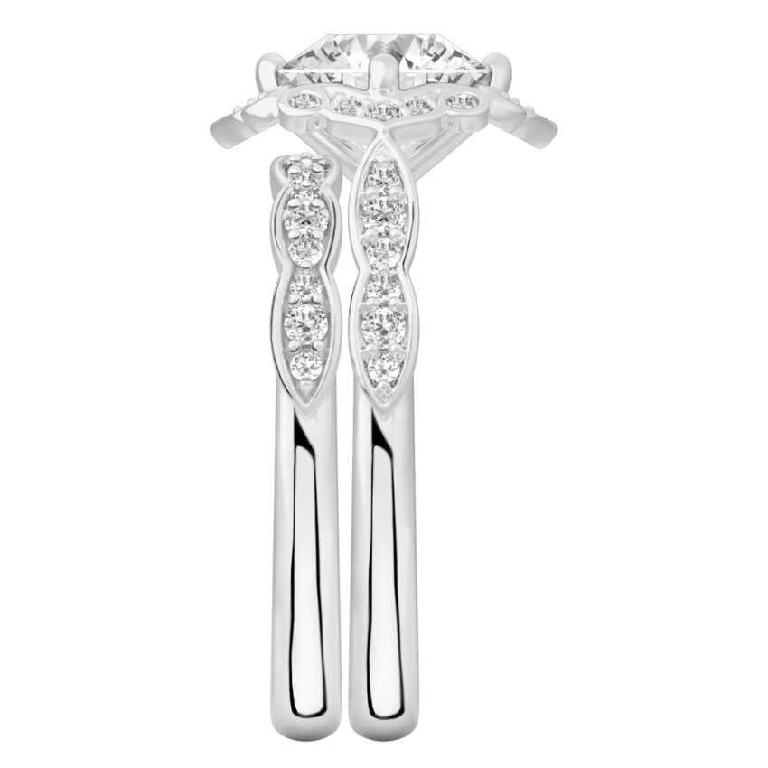 Side view of round cut diamond floral engagement ring set palladium