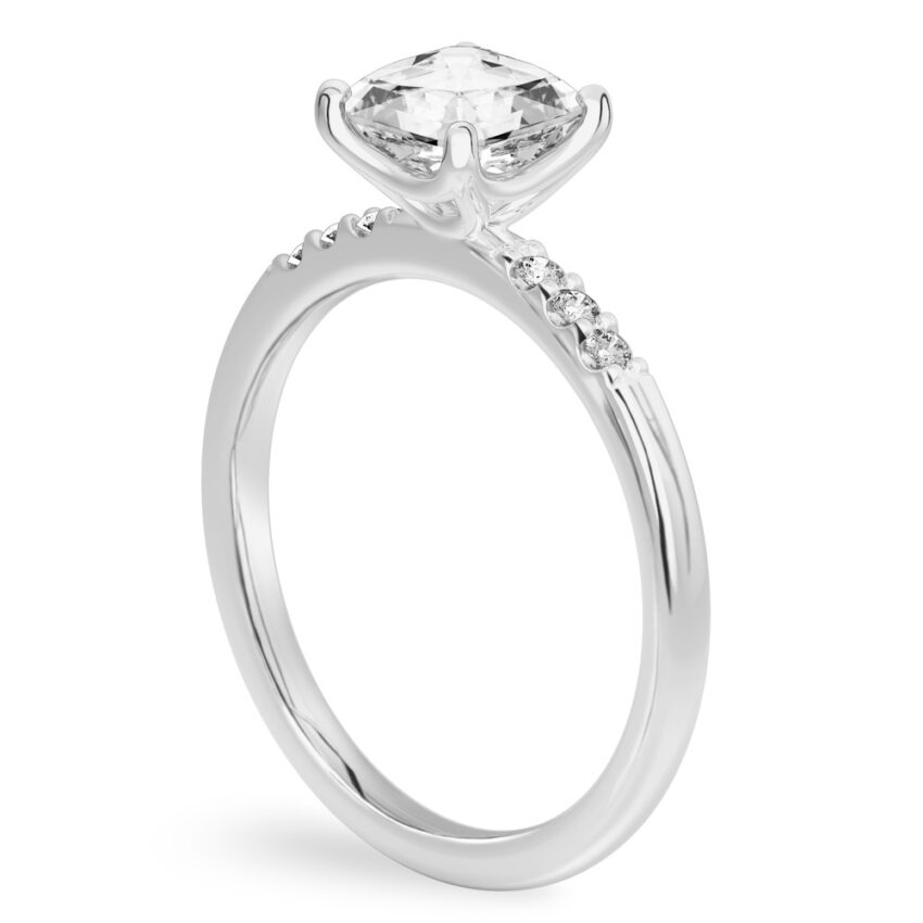 Angle view of asscher cut diamond minimalist pave engagement ring in platinum